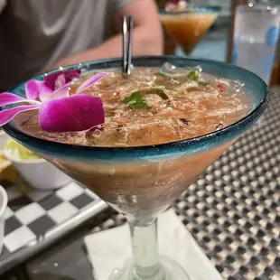 a drink in a martini glass