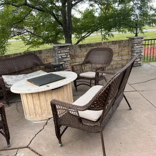 a table and chairs on a patio