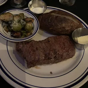 NY Strip with brussels and baked potato