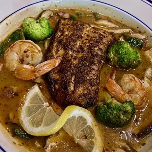 Commanders Fish of The Day- Tasso ham, Shitakemushrooms, Poblano peppers, in a cajun creole sauce with grilled shrimp. Amazing