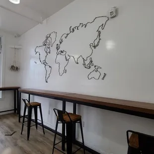 a map of the world on the wall