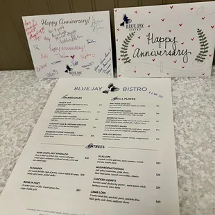 Menu with anniversary card.