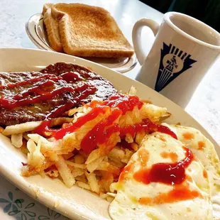 Sausage toast hash browns eggs over easy coffee