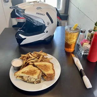 a plate of food and a helmet