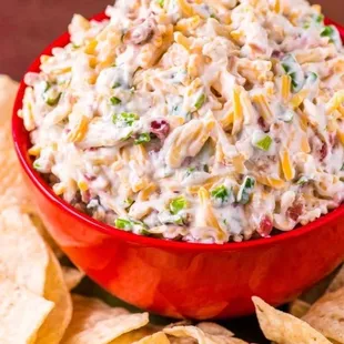 To make your own million dollar dip, all you need is six ingredients: mayonnaise, cheddar cheese, green onions.