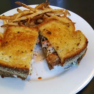 Pulled pork sandwich with coleslaw.