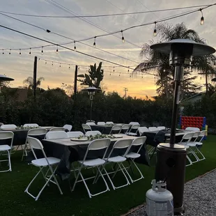 Tables, chairs, and heaters.