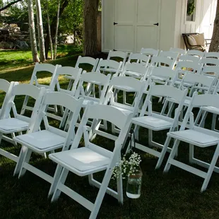 Resin chairs at a formal event