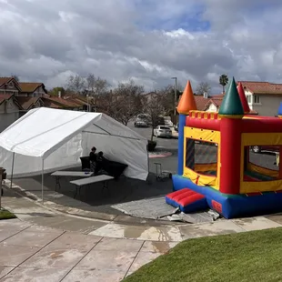 20x20 tent along with multi color jumper 15ft by 15