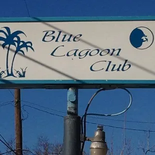 a sign for the blue lagoon club