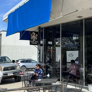 Outdoor seating + coffee shop store front
