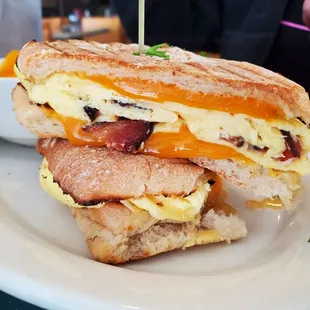 Bacon egg and cheese breakfast panini sandwich