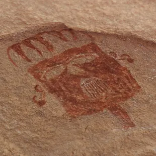 One of the hundreds of Jornada Mogollon face masks that you can find in Hueco Tanks, painted sometime between 0 - 1400 AD.