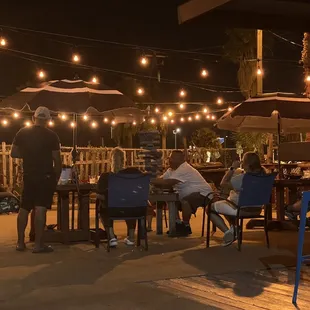 a group of people sitting at a table