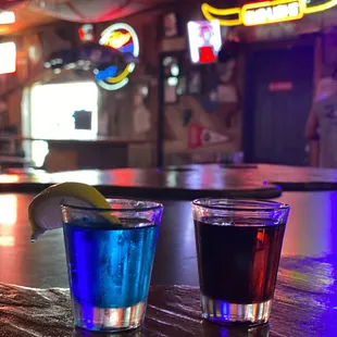 two shot glasses of alcohol