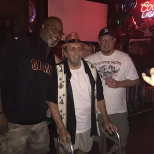 a group of men posing for a picture