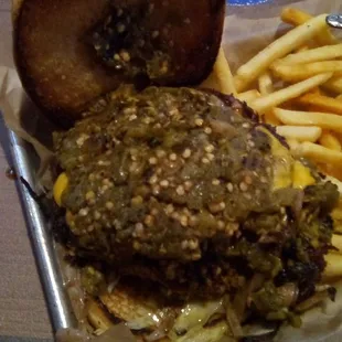 Double Green Chile Cheeseburger at the Blue Moon Bar and Grill. Burger was very good with lots of  green chile. Fries were fairly good.
