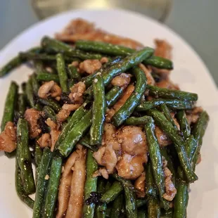 Stir fry green bean black bean sauce chicken.