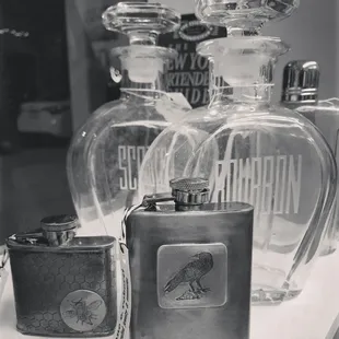Vintage Decanters and handcrafted stainless steel flasks by NY artist.
