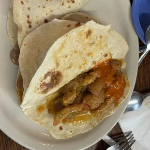 Chicharrones en salsa &amp; one carne guisada breakfast tacos...