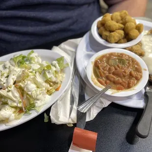 Side salad, chicken fried steak, pinto beans, fried okra