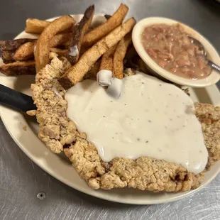 Chicken fried steak with two sides.