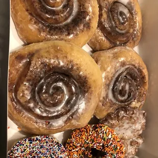 Cinnamon rolls, sprinkle donuts, apple fritter