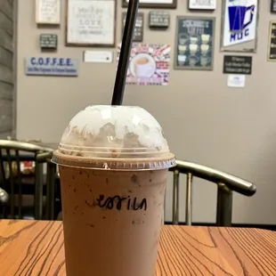 a cup of coffee on a table