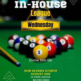 a pool table with pool balls and a pencil