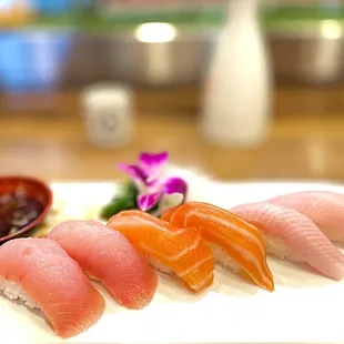 Albacore(White tuna), salmon and yellowtail nigiri.