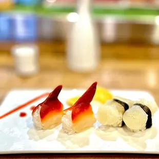 Sea clam and scallop nigiri.