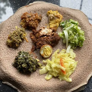 Veggie sampler, doro wat (there was wayyy more food this is just my portion).