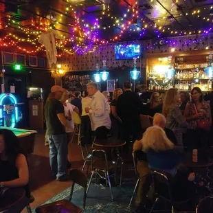 a pool table and people