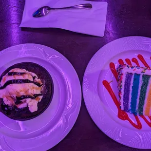 Rainbow cake and fudge brownie with vanilla ice cream.
