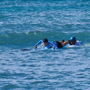 Coach Frank helping me catch waves!