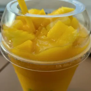 a smoothie in a plastic cup