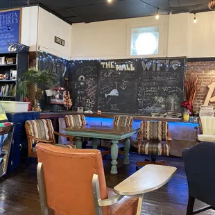 seating and chalkboard wall