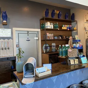 the counter and shelves of the restaurant