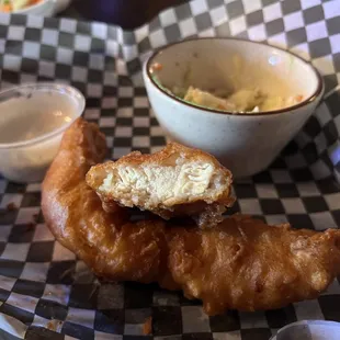 a plate of fish and chips and a bowl of soup