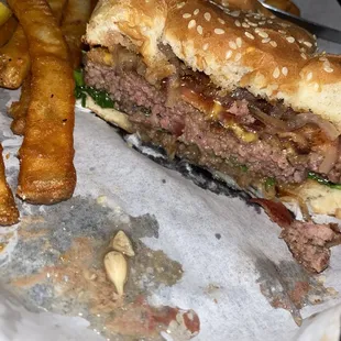 Bacon cheeseburger with well done fries.