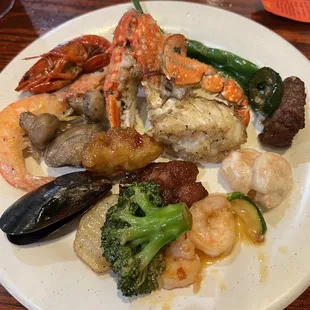 Assortment of scrumptious seafood, veggies and meats (my daughter had the green beans with every plate)