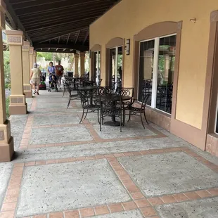 patio area with tables and chairs