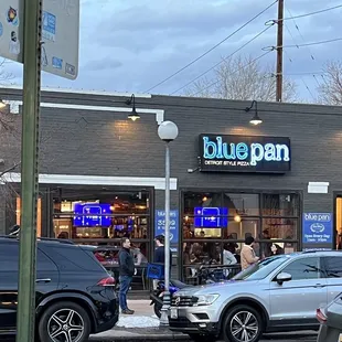 cars parked in front of the restaurant