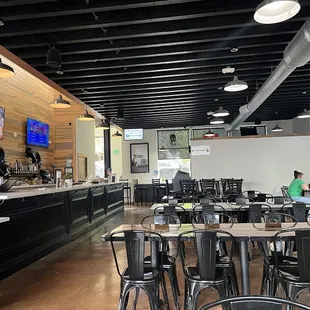 Photo of the bar, we sat near the windows.  Chairs are uncomfy, but there are bench seats around the walls.