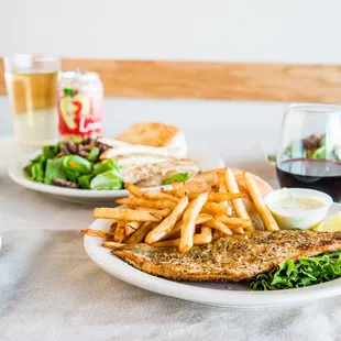 Wallleye plate with fries and a side salad paired with our beer, wine and cider selections.