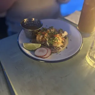 Chicken tacos. The food is not very large portions however it&apos;s appropriate for the setting. Very delicious.