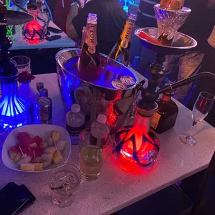 a table with drinks and snacks