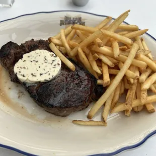 NY Strip with truffle butter and fries