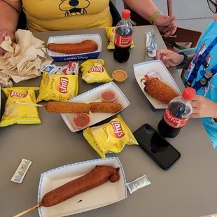 What you see is three classic corn dogs one pickle dog one mozzarella stick dog very good and delicious
