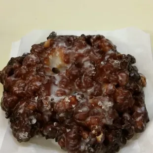 This is one big a*s apple fritter! Look at the crunchiness on this sucker! It weighs 3-5 lbs! ;)